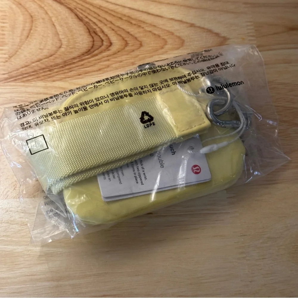 NWT Lululemon Dual Pouch Wristlet Daisy Yellow Light Ivory NWT - Picture 6 of 7